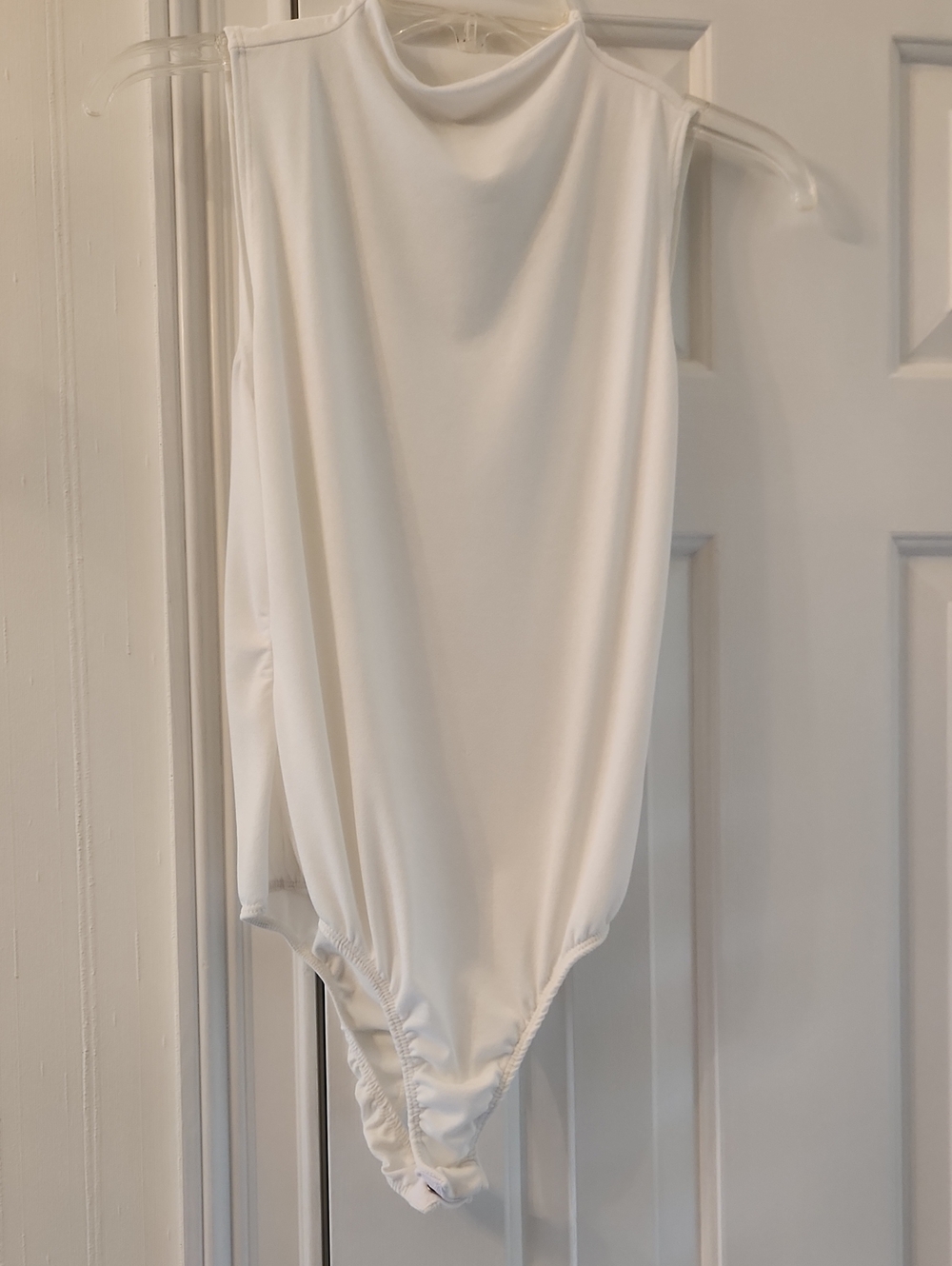 Sleek White Sleeveless Mock Neck Bodysuit